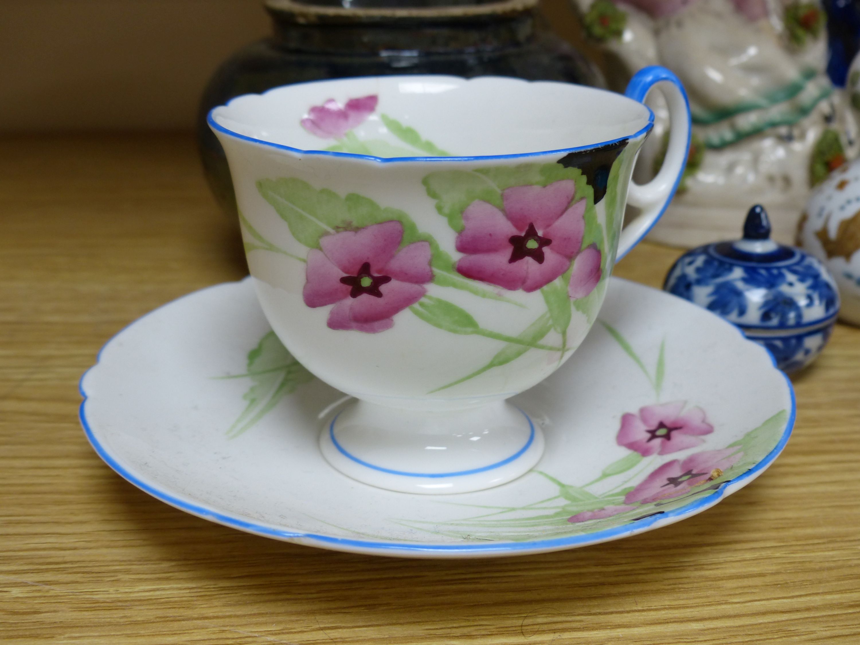 A group of ceramics including a Shelley cup and saucer, a Staffordshire flatback, a Wedgwood miniature bowl etc.